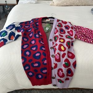 The cutest long, multi colored, leopard print sweater. NEVER WORN!